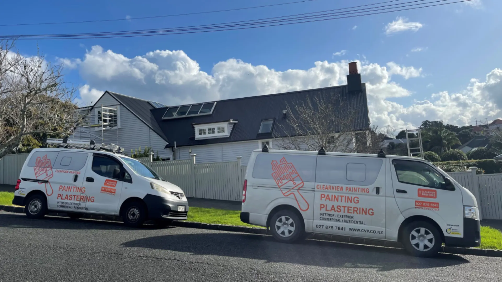 two white vans with Clearview Painting logos on them